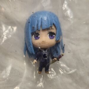 Blue Haired Anime Figure with Purple Eyes